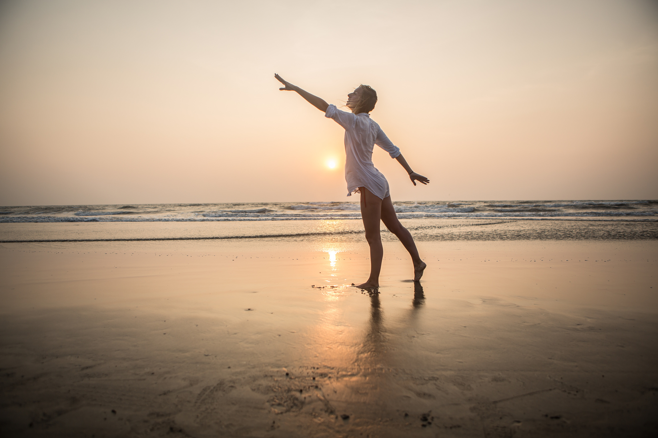 Healthy woman natural balance on beach